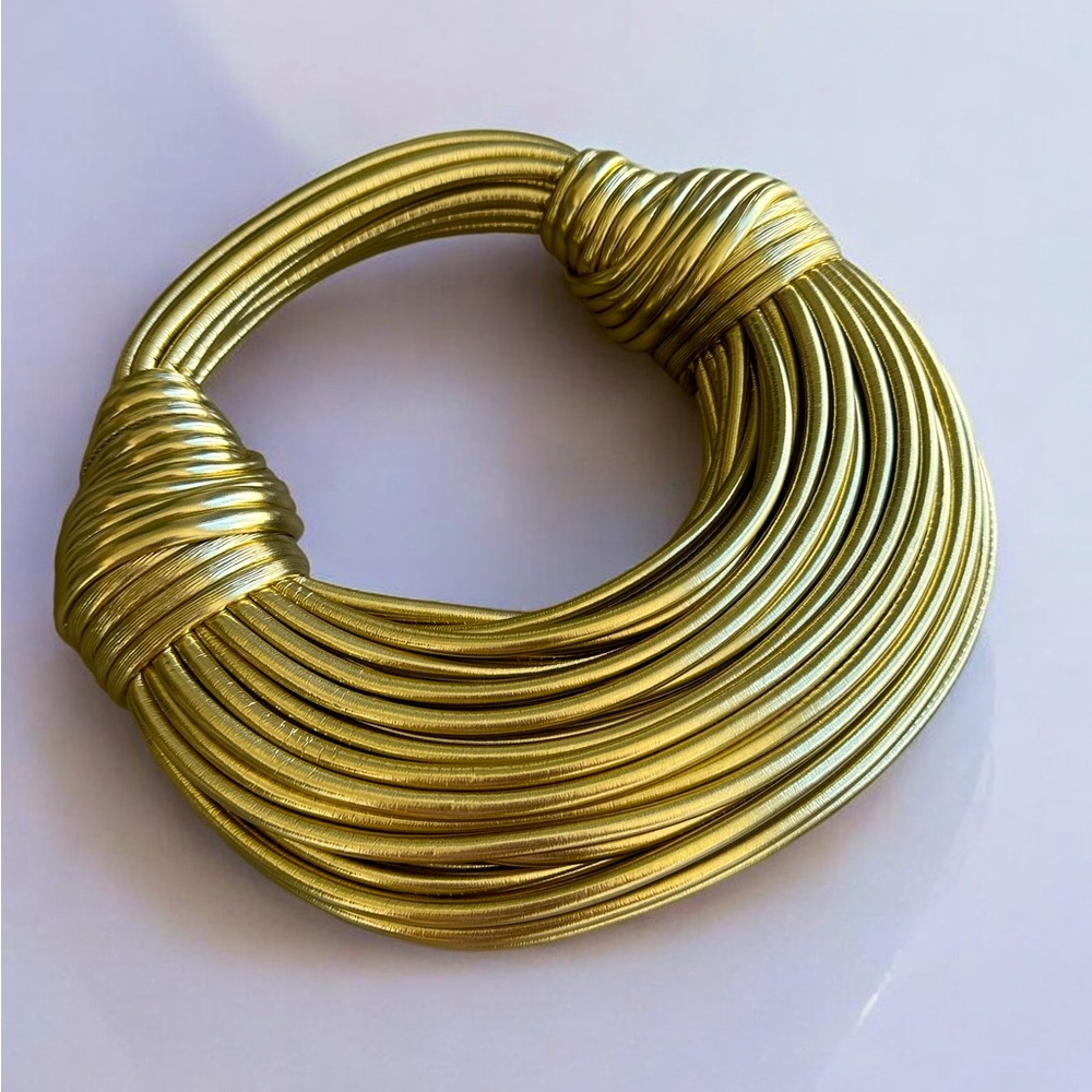 Gold hand bag